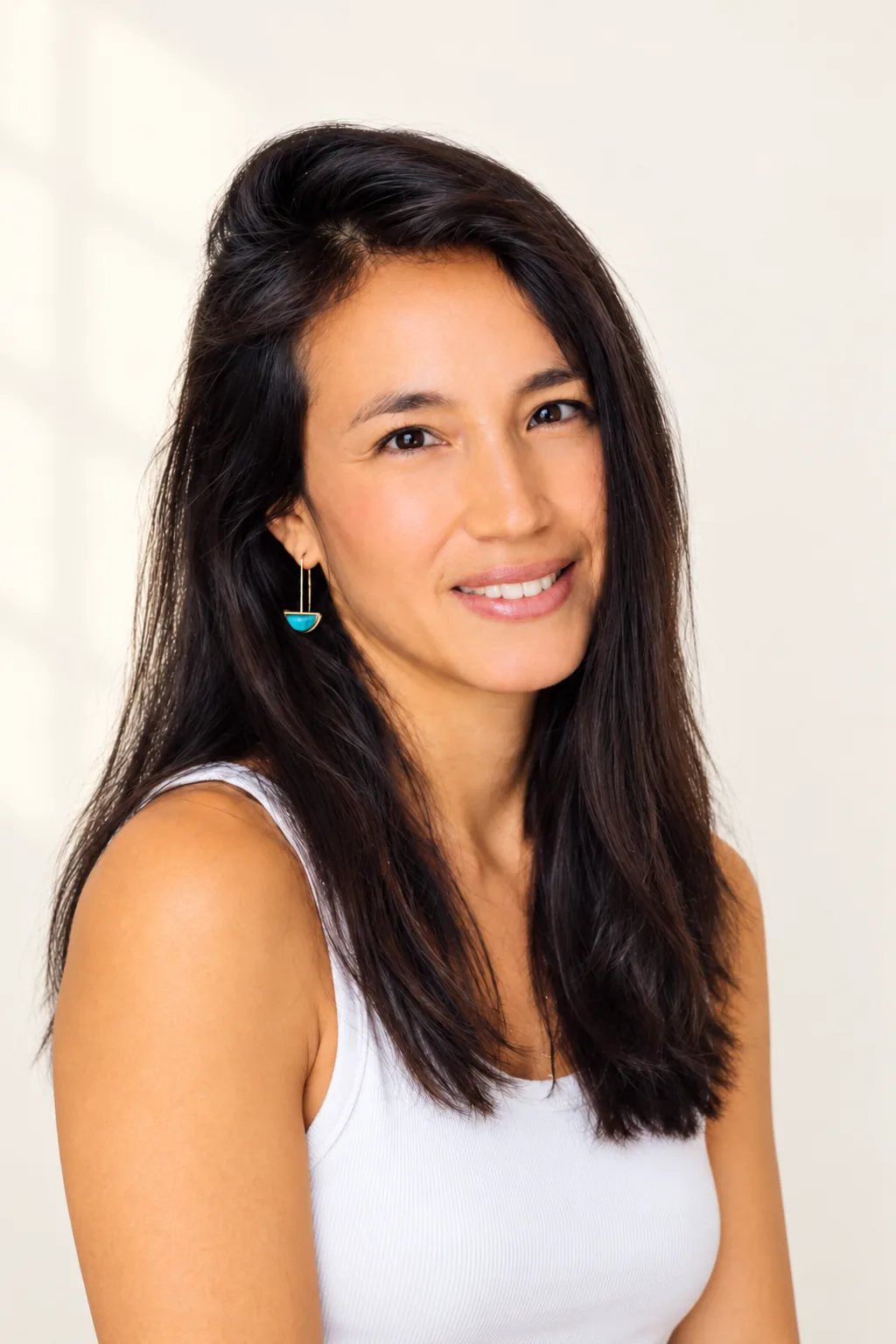 Marielisa Padilla, portrait on an ivory wall